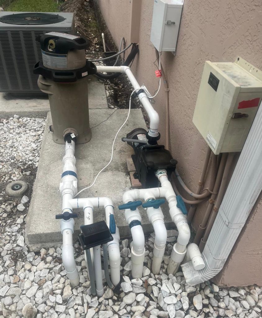 Outdated pool equipment area before complete system upgrade